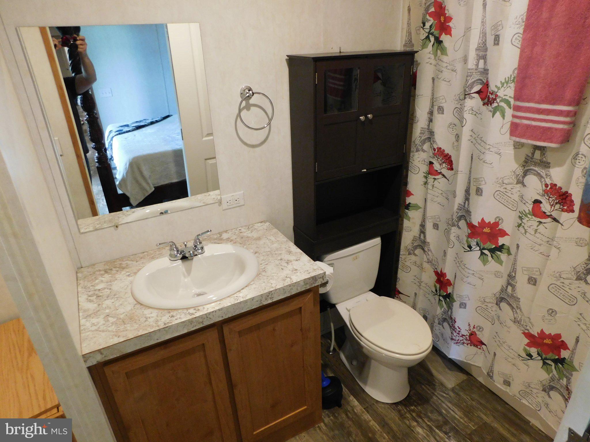 119 Meadow Lane Lititz, PA 17543 - Photo 8 of 13 a bathroom with a sink vanity mirror and toilet