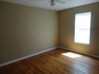 3313 27th Street Lubbock, TX 79410 - Photo 5 of 8 an empty room with a window