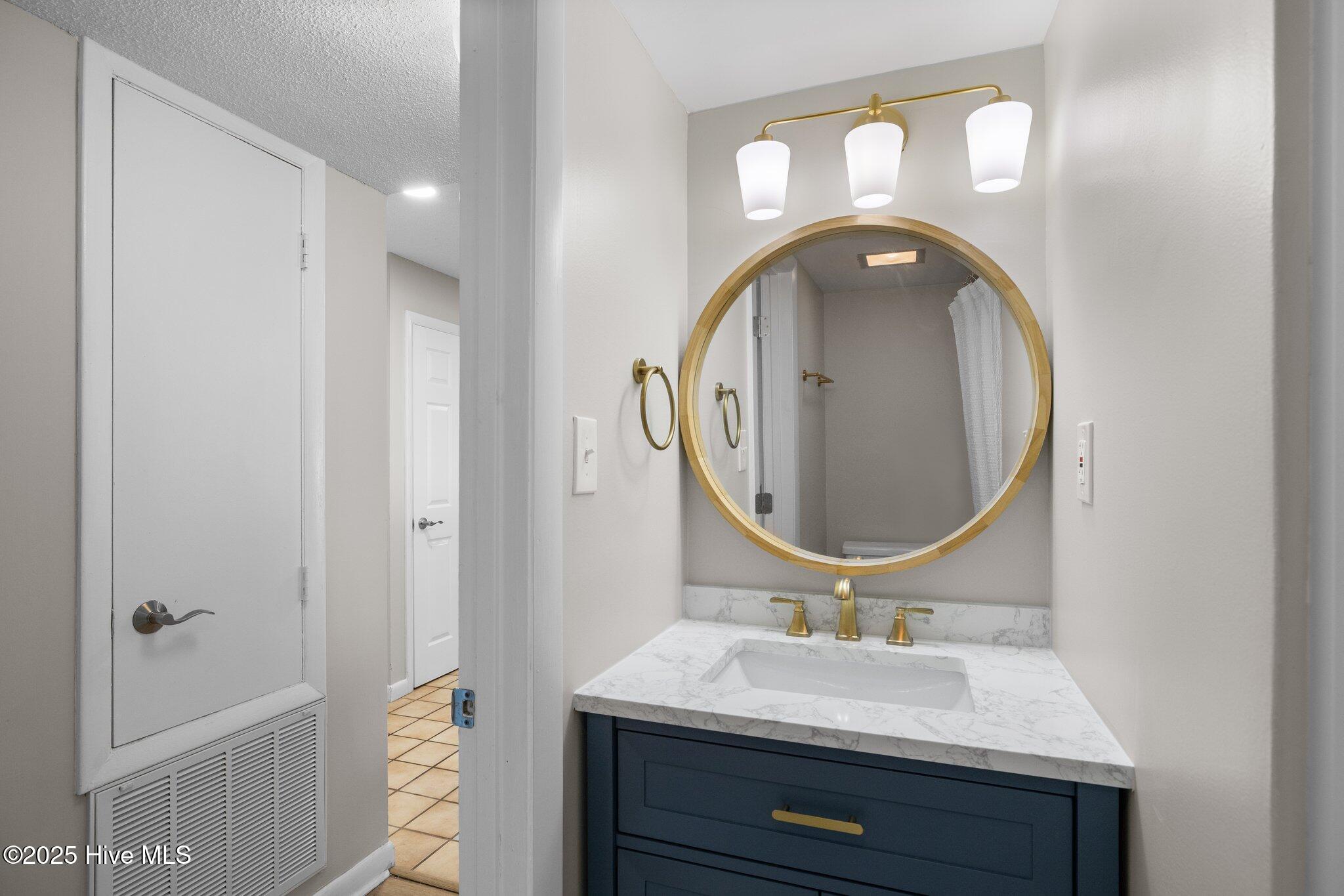 1505 Salter Path Road, Unit 409 Indian Beach, NC 28512 - Photo 25 of 35 Guest Bath