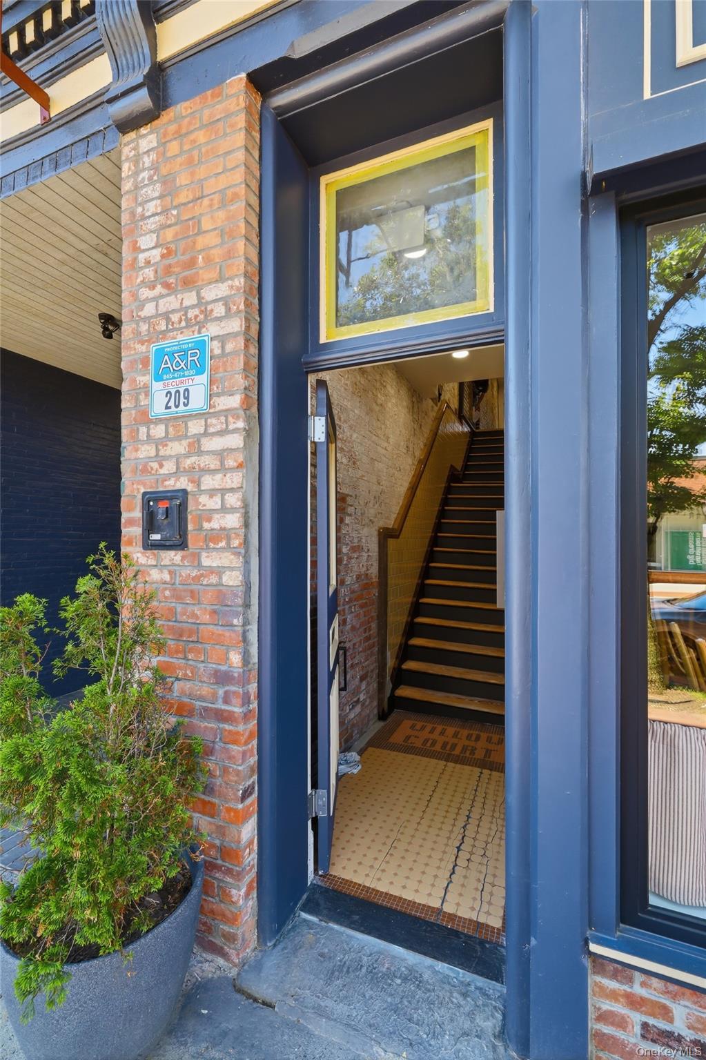 207 Main Street, Unit 3 Beacon, NY 12508 - Photo 4 of 23 a view of an entryway door of the house