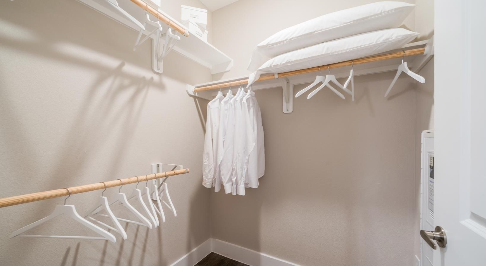 4647 Harvest Corner Drive, Unit 1114 Richmond, TX 77406 - Photo 14 of 34 a view of walk in closet with empty racks