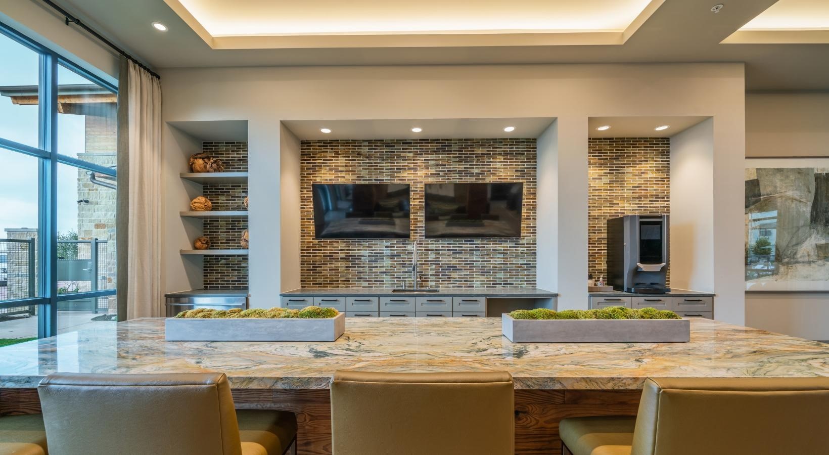 4647 Harvest Corner Drive, Unit 1114 Richmond, TX 77406 - Photo 30 of 34 a kitchen with a sink stove and cabinets