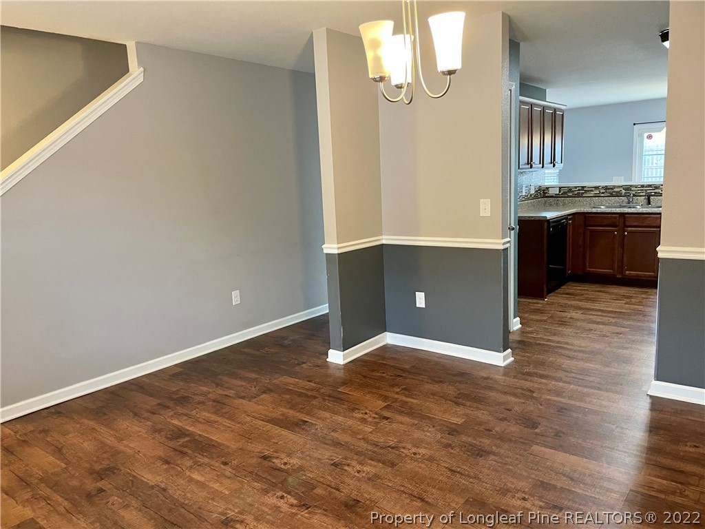 251 Botanical Court Bunnlevel, NC 28323 - Photo 13 of 16 a view of kitchen with wooden floor