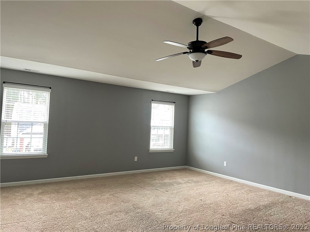 251 Botanical Court Bunnlevel, NC 28323 - Photo 15 of 16 a view of empty room with windows
