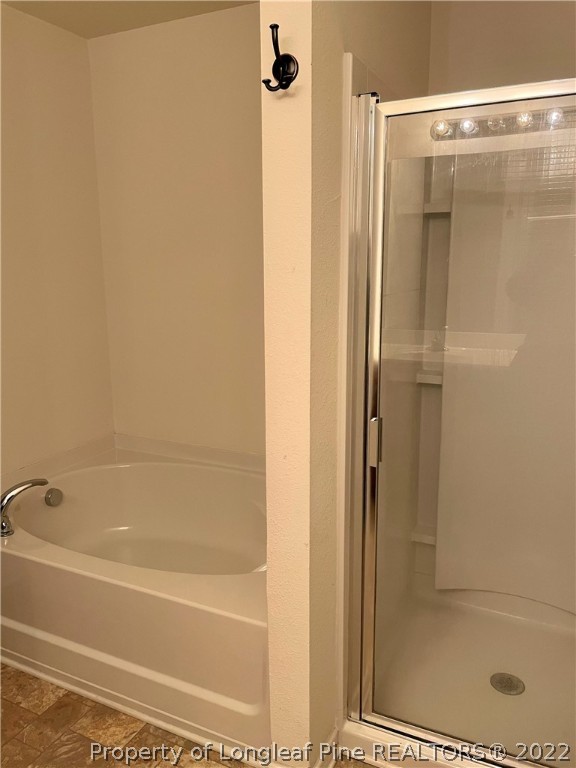 251 Botanical Court Bunnlevel, NC 28323 - Photo 9 of 16 a bathroom with a shower