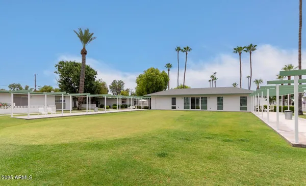 a view of a house with a garden