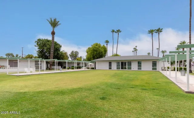 a view of a house with a garden