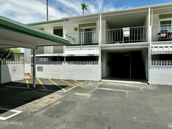 a view of residential houses with outdoor space