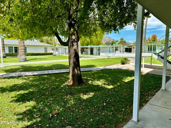 a view of a house with a big yard