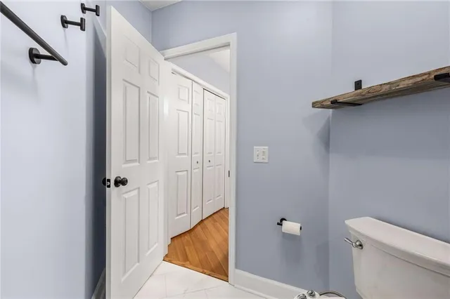 a view of a bathroom from a hallway