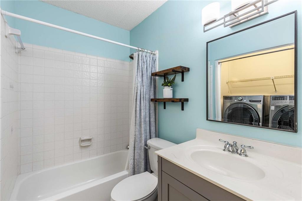 490 Sherman Way Decatur, GA 30033 - Photo 36 of 44 a bathroom with a sink toilet and shower