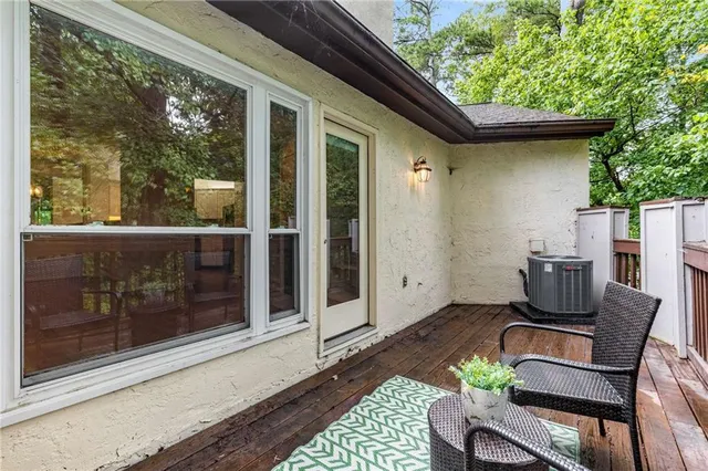 a view of a porch with furniture