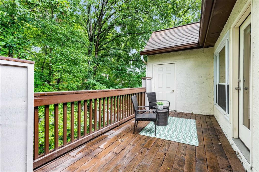 490 Sherman Way Decatur, GA 30033 - Photo 39 of 44 a view of balcony with wooden floor and outdoor seating
