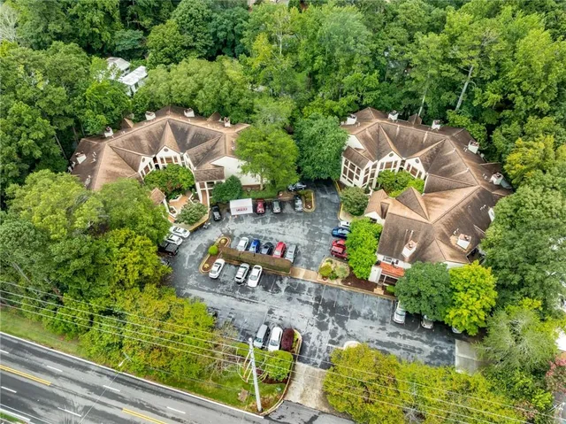 an aerial view of a house with a garden