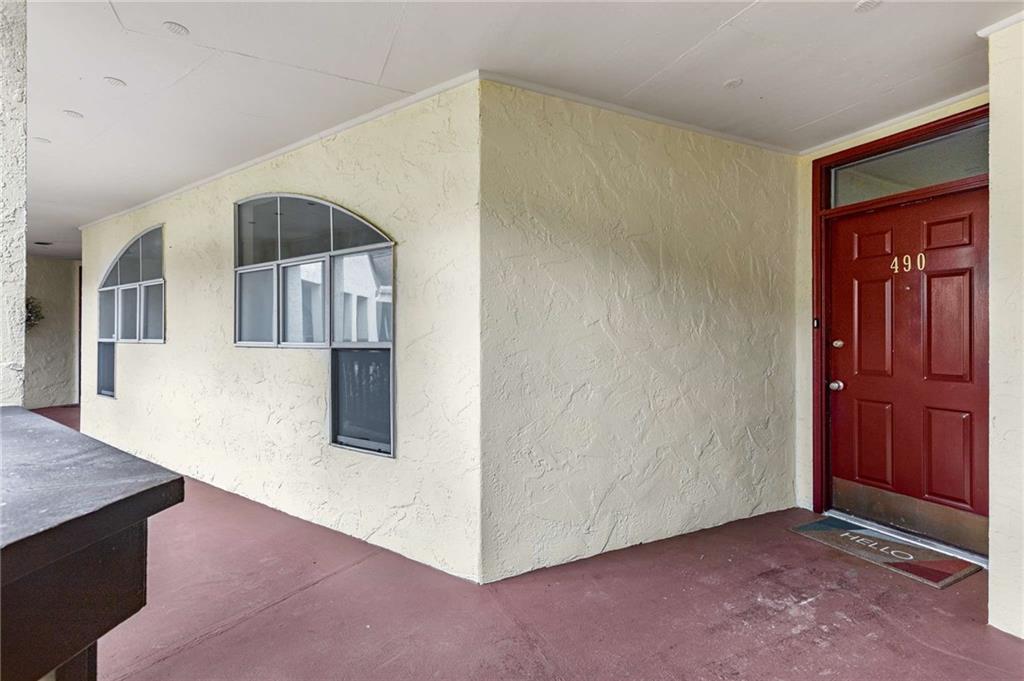 490 Sherman Way Decatur, GA 30033 - Photo 6 of 44 a view of a hallway with entryway wooden floor and cabinet