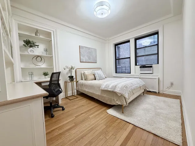 a kitchen with granite countertop a sink and a stove top oven
