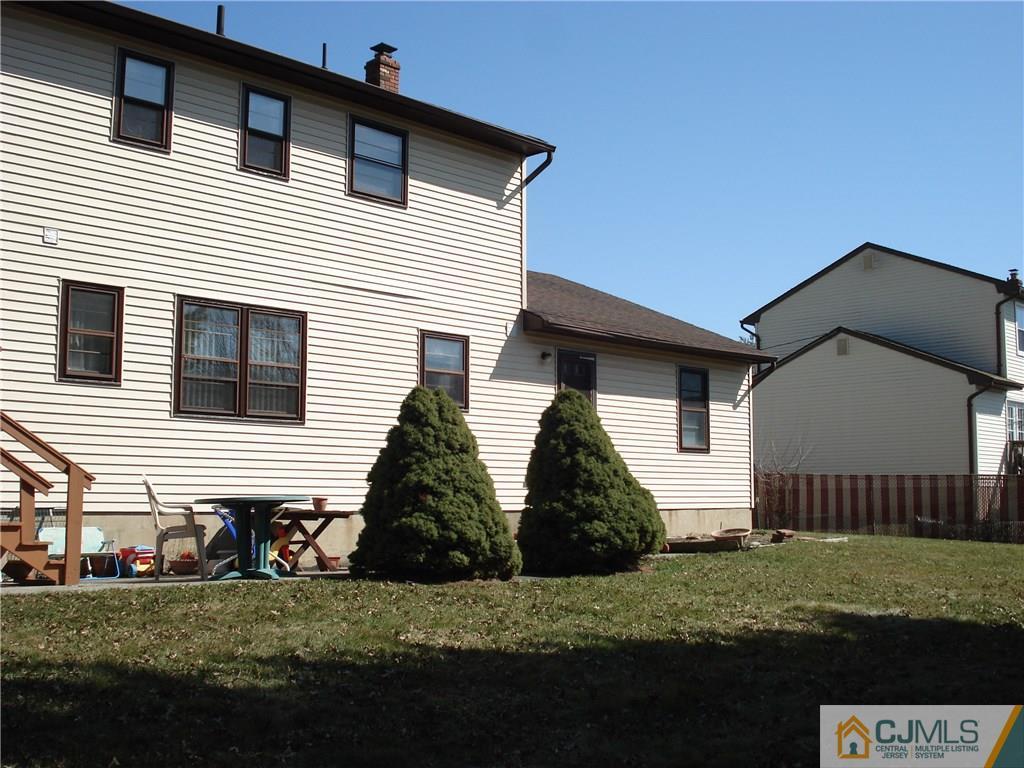 30 New Brooklyn Road Edison, NJ 08817 - Photo 5 of 5 a front view of a house with a yard