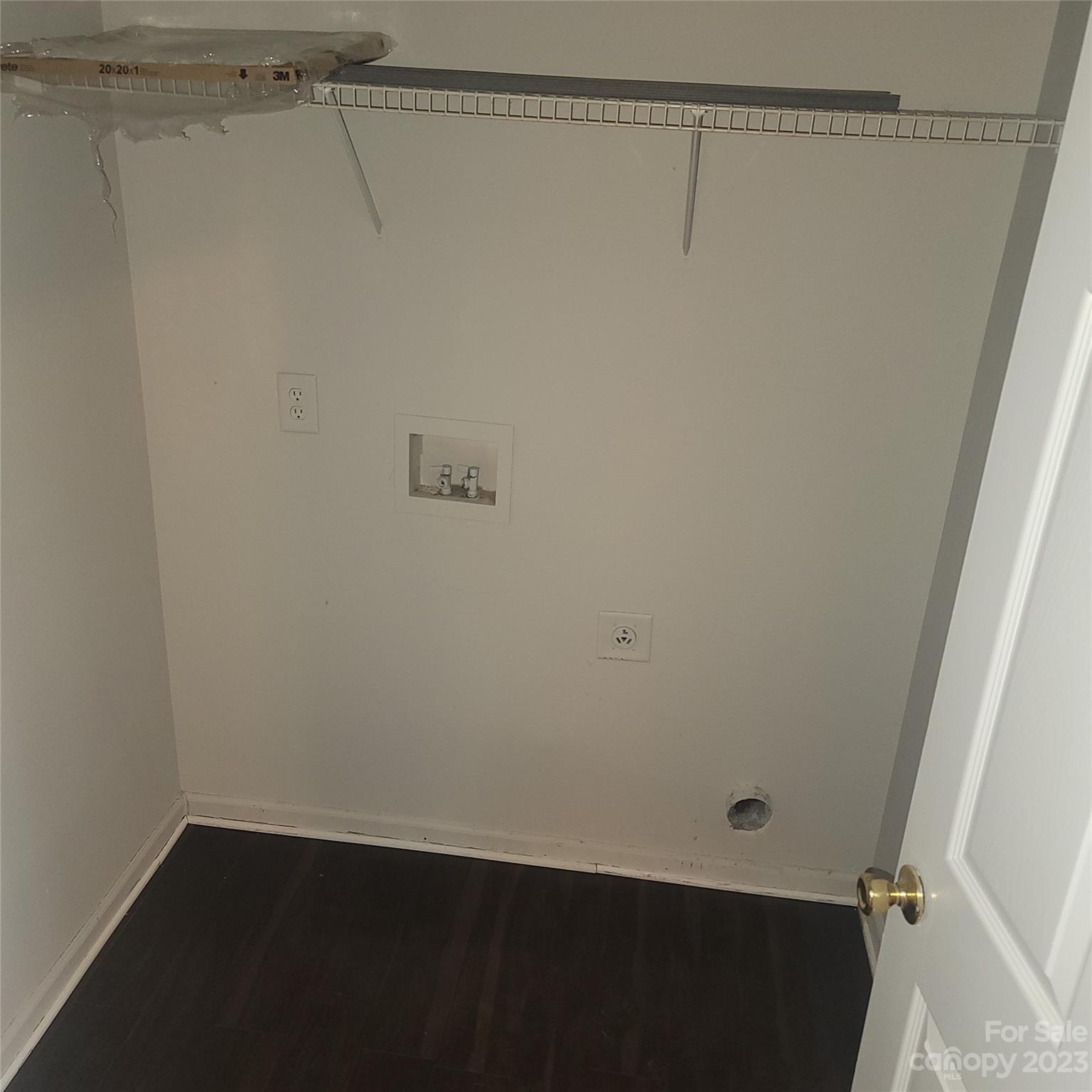 2865 Oasis Lane Charlotte, NC 28214 - Photo 14 of 15 a view of small space with racks on the wall