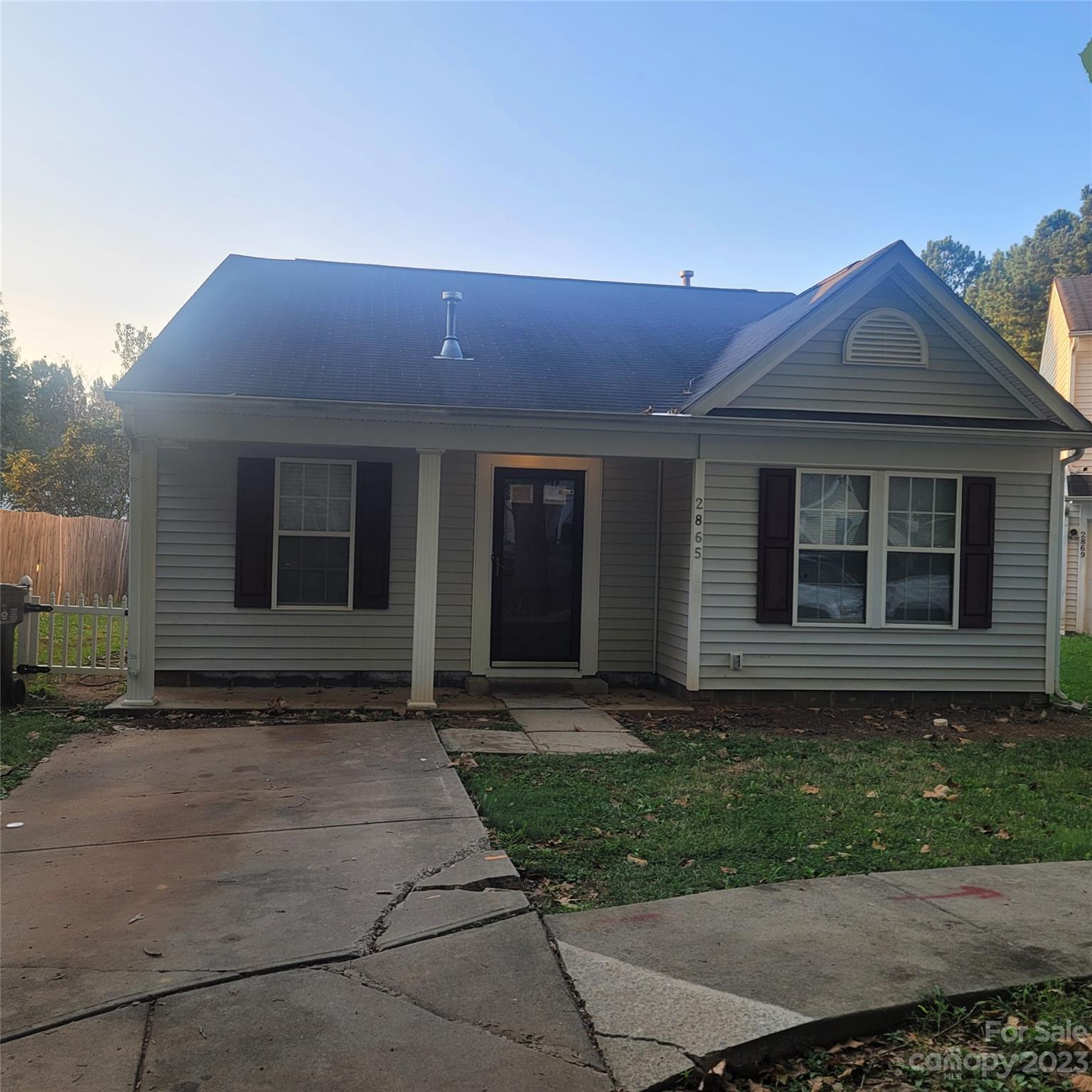 2865 Oasis Lane Charlotte, NC 28214 - Photo 15 of 15 a front view of a house with garden