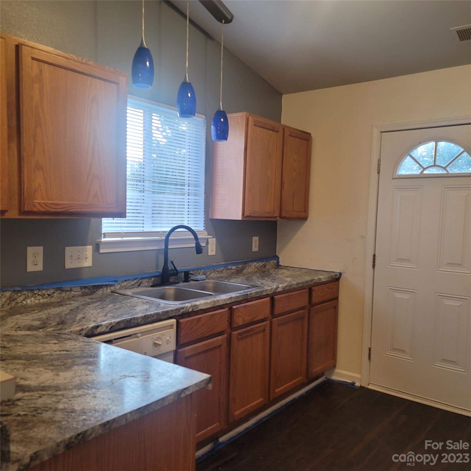 2865 Oasis Lane Charlotte, NC 28214 - Photo 6 of 15 a kitchen with sink and cabinets