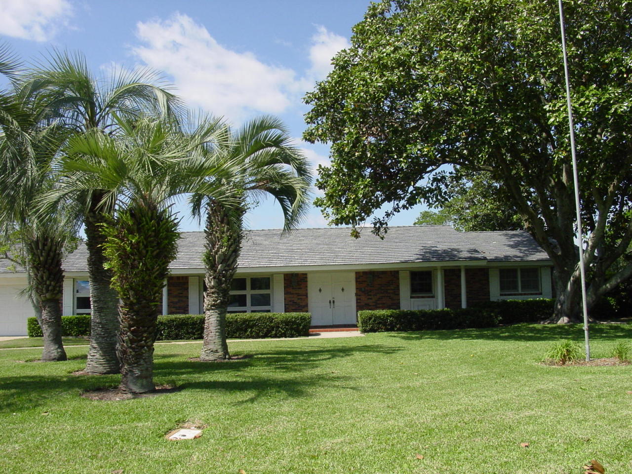 234 Pablo Road Ponte Vedra Beach, FL 32082 - Photo 5 of 22 a front view of a house with a garden