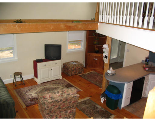 38 Hatherly Road Scituate, MA 02066 - Photo 4 of 10 a living room with furniture and a flat screen tv