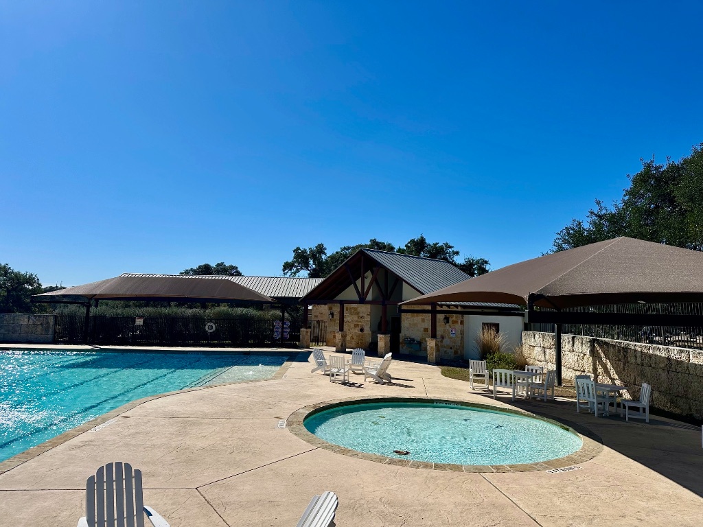 110 Alf Hunter Blanco, TX 78606 - Photo 10 of 18 a front view of house with yard and outdoor seating