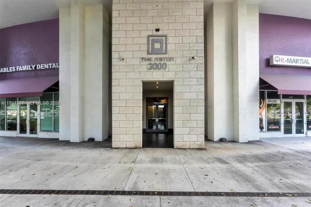 a view of front door with yard