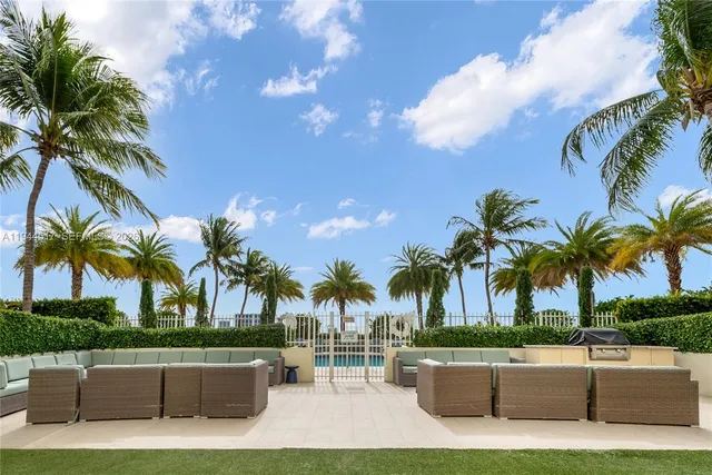 a view of outdoor space with palm trees