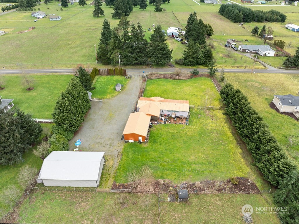17043 Leitner Road Southwest Rochester, WA 98579 - Photo 6 of 18 a view of a lake with a house