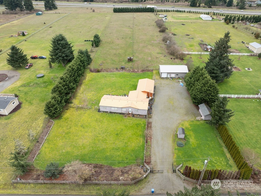 17043 Leitner Road Southwest Rochester, WA 98579 - Photo 7 of 18 a view of a yard with an outdoor space