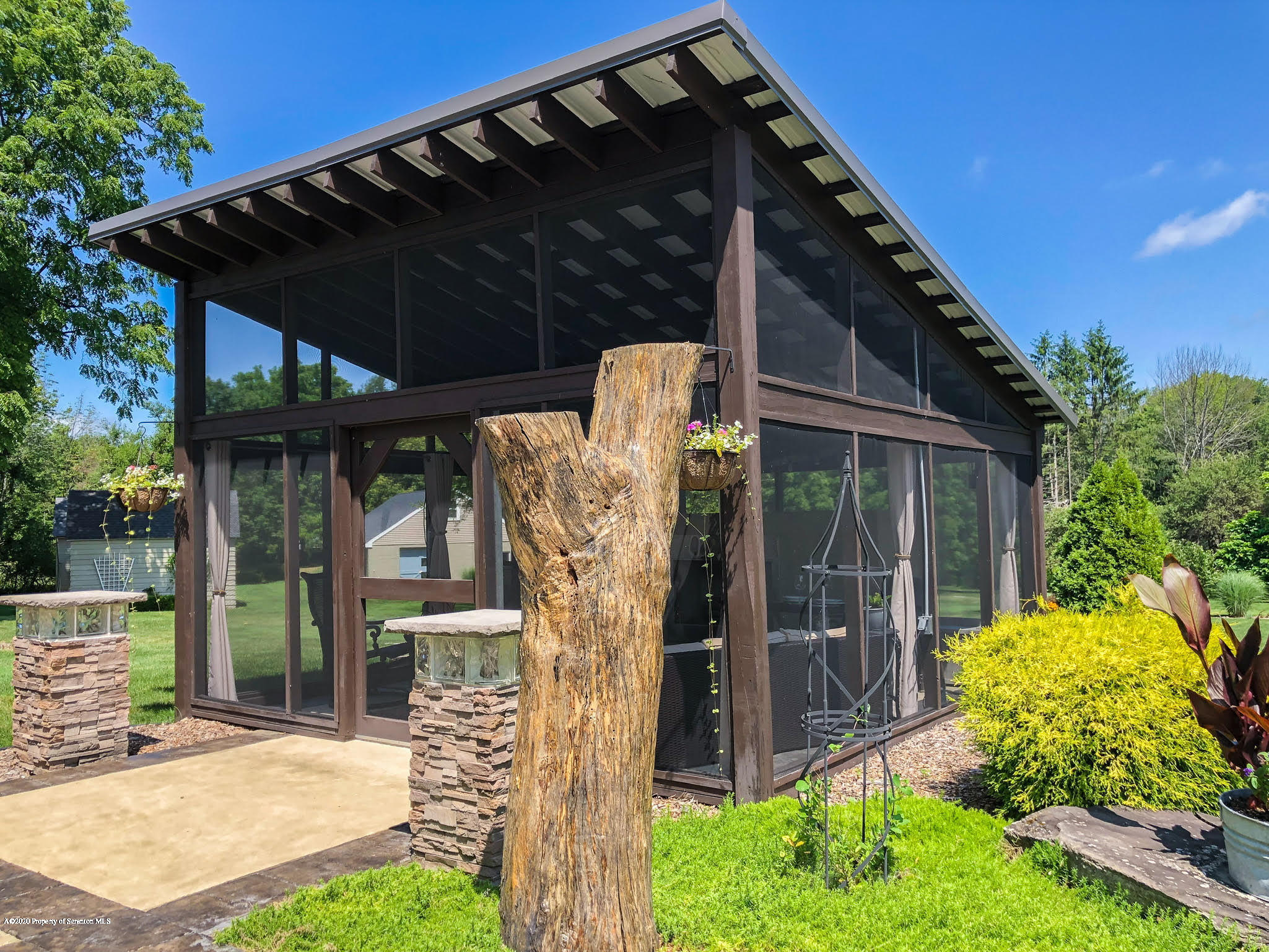 1164 Old Trail Road Clarks Summit, PA 18411 - Photo 27 of 36 patio screened in area