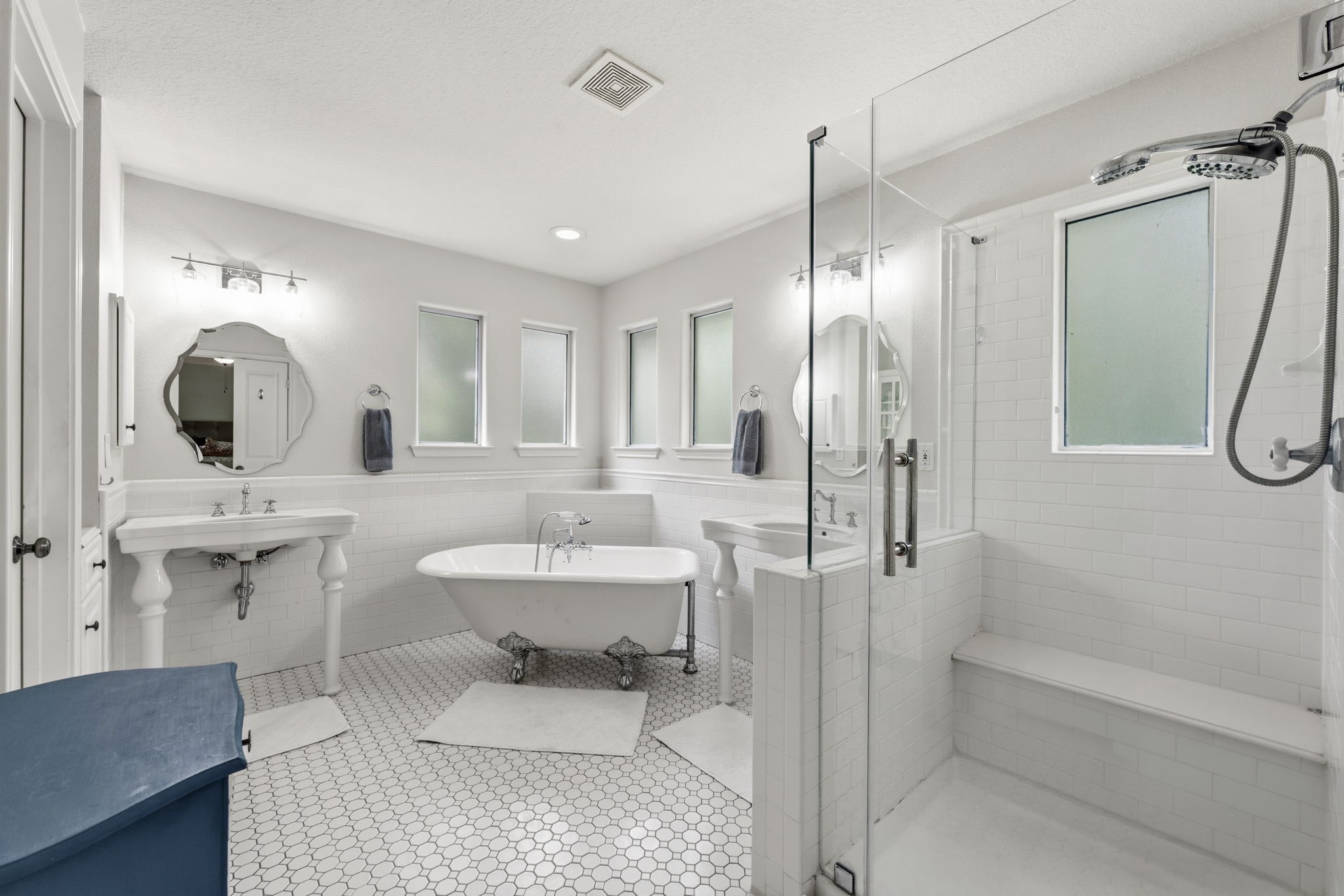 6 North Flickering Sun Circle Spring, TX 77382 - Photo 18 of 33 Primary bathroom has been remodeled. Crisp and clean offering a very airy atmosphere!