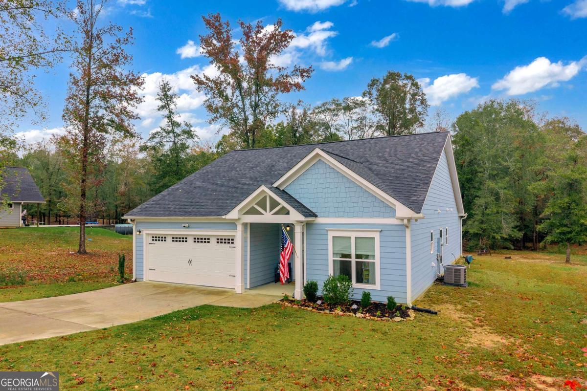 153 North Point Circle Hartwell, GA 30643 - Photo 53 of 60 a view of a house with a yard and tree s
