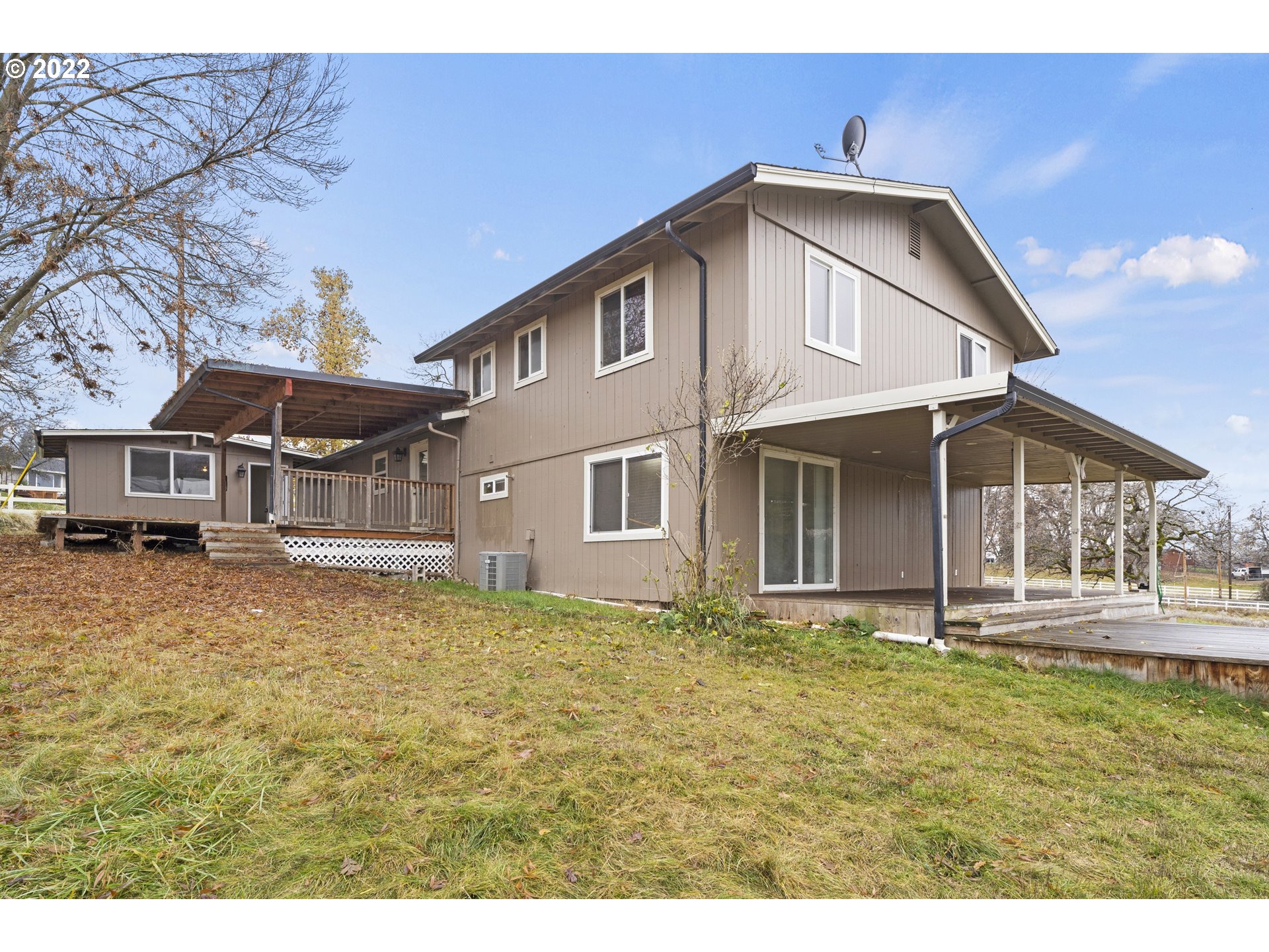 13644 Agate Road Eagle Point, OR 97524 - Photo 24 of 32 a front view of a house with a yard