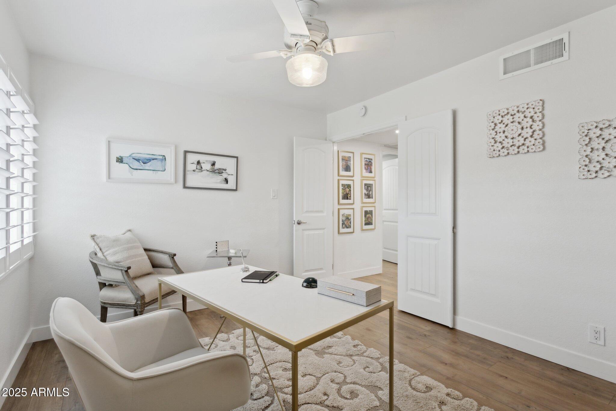 216 West Winged Foot Road Phoenix, AZ 85023 - Photo 22 of 55 a living room with furniture and a table