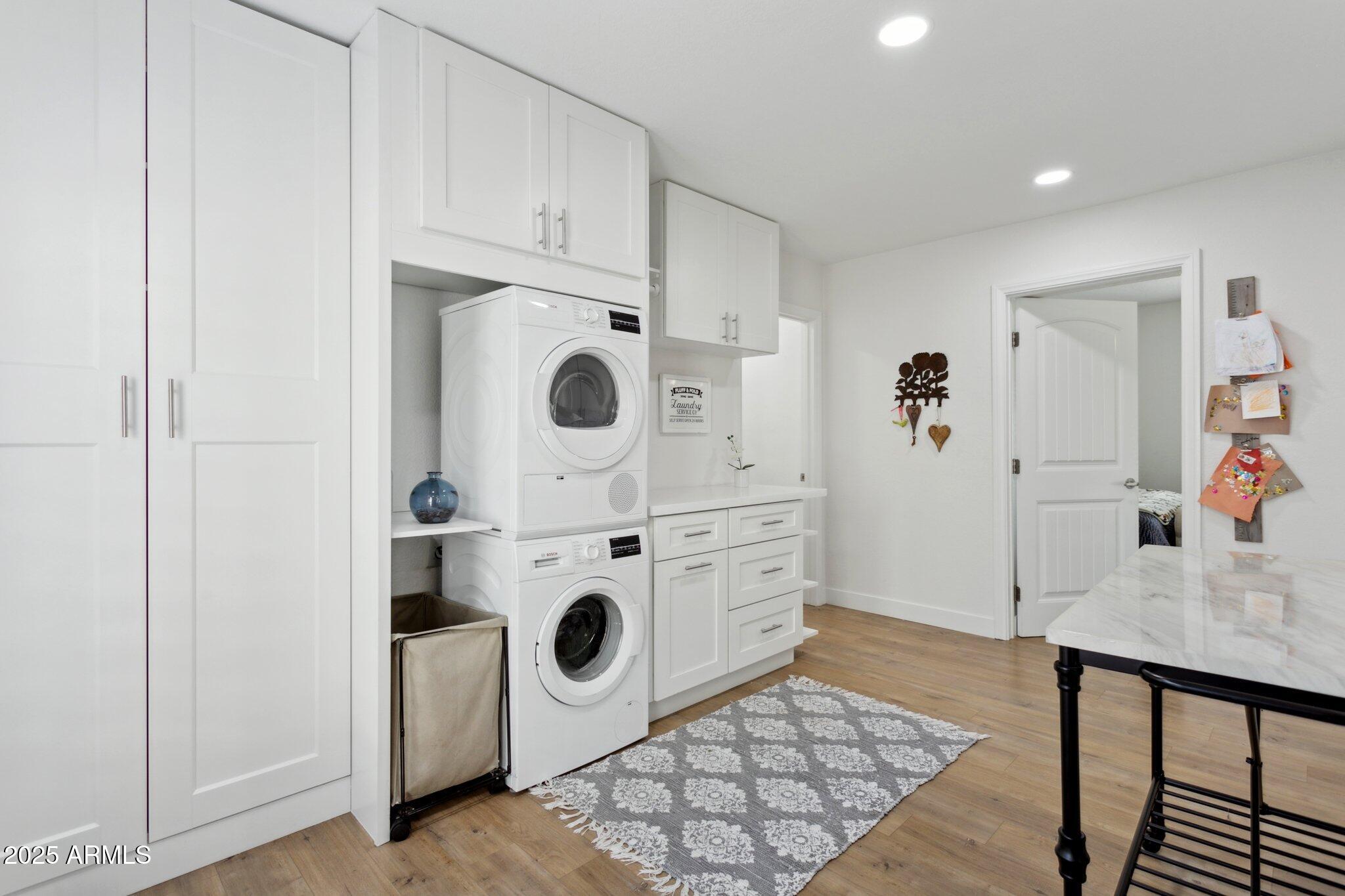 216 West Winged Foot Road Phoenix, AZ 85023 - Photo 25 of 55 a utility room with dryer and washer