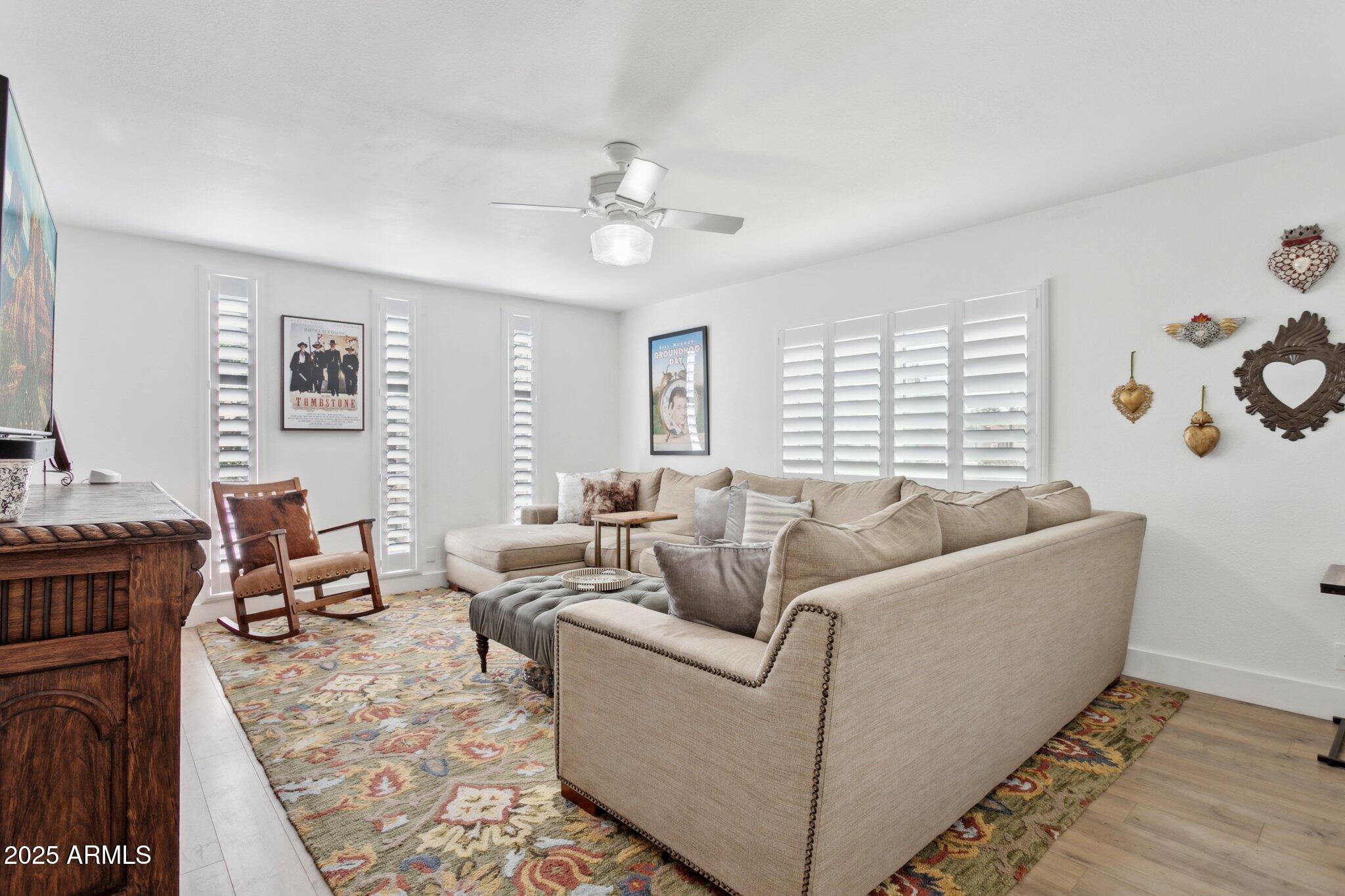216 West Winged Foot Road Phoenix, AZ 85023 - Photo 30 of 55 a living room with furniture and a window