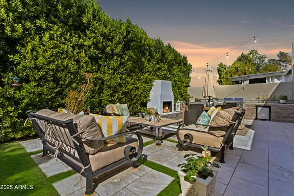 a view of patio with outdoor seating