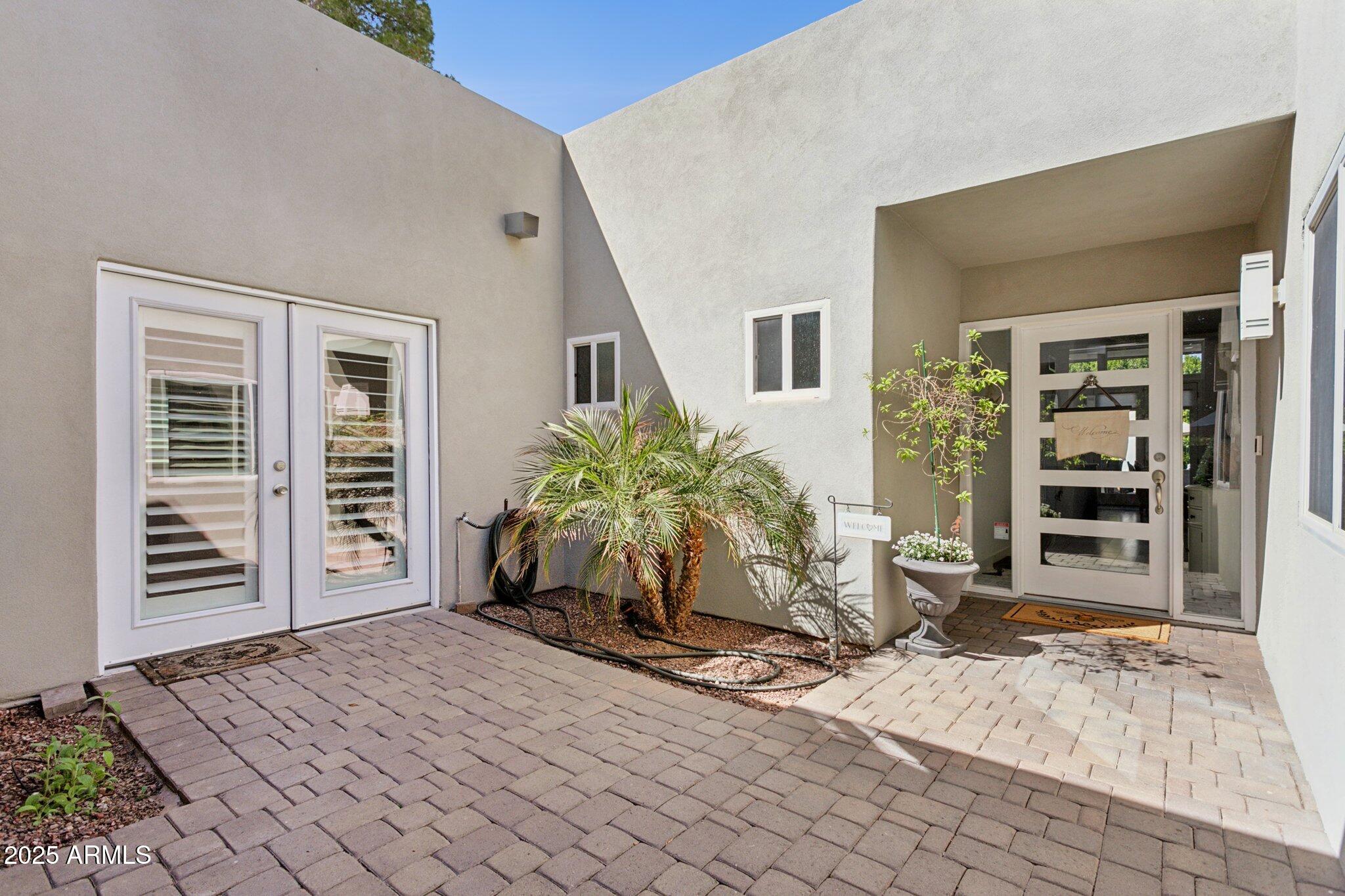 216 West Winged Foot Road Phoenix, AZ 85023 - Photo 50 of 55 a view of a entryway door front of house