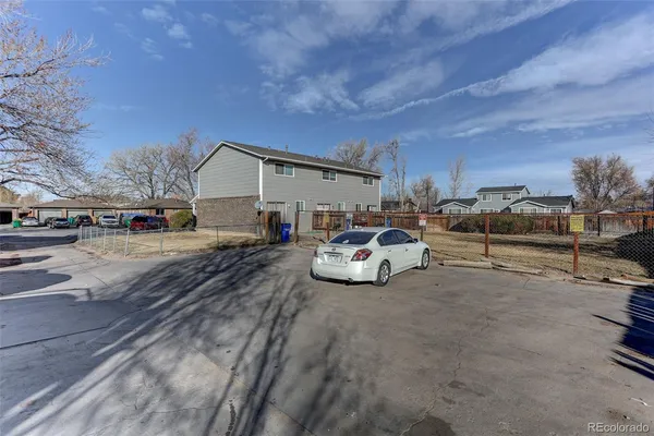 a view of a terrace with wooden floor and lake