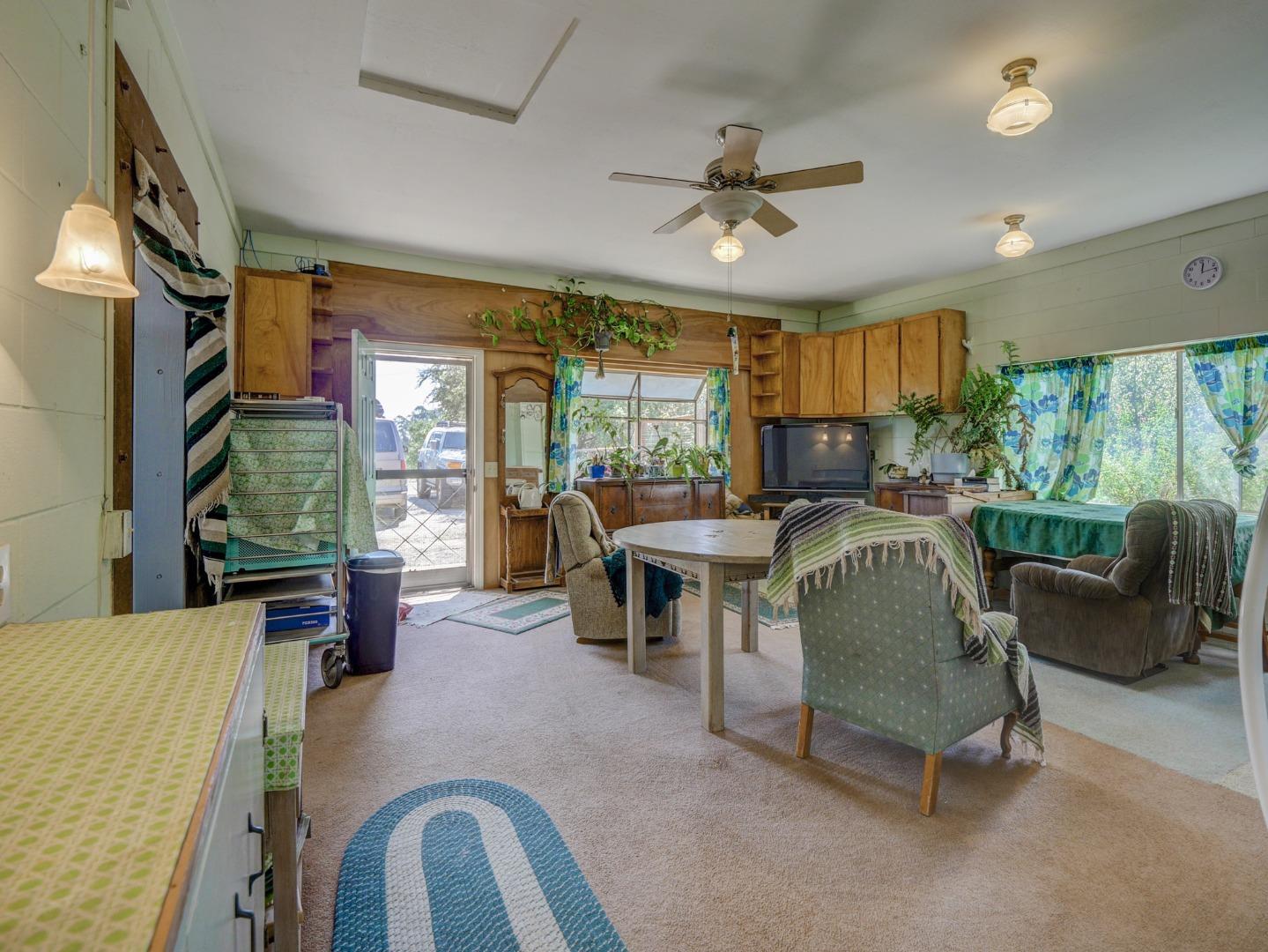 770 Calabasas Road Watsonville, CA 95076 - Photo 18 of 39 a living room with furniture and a large window