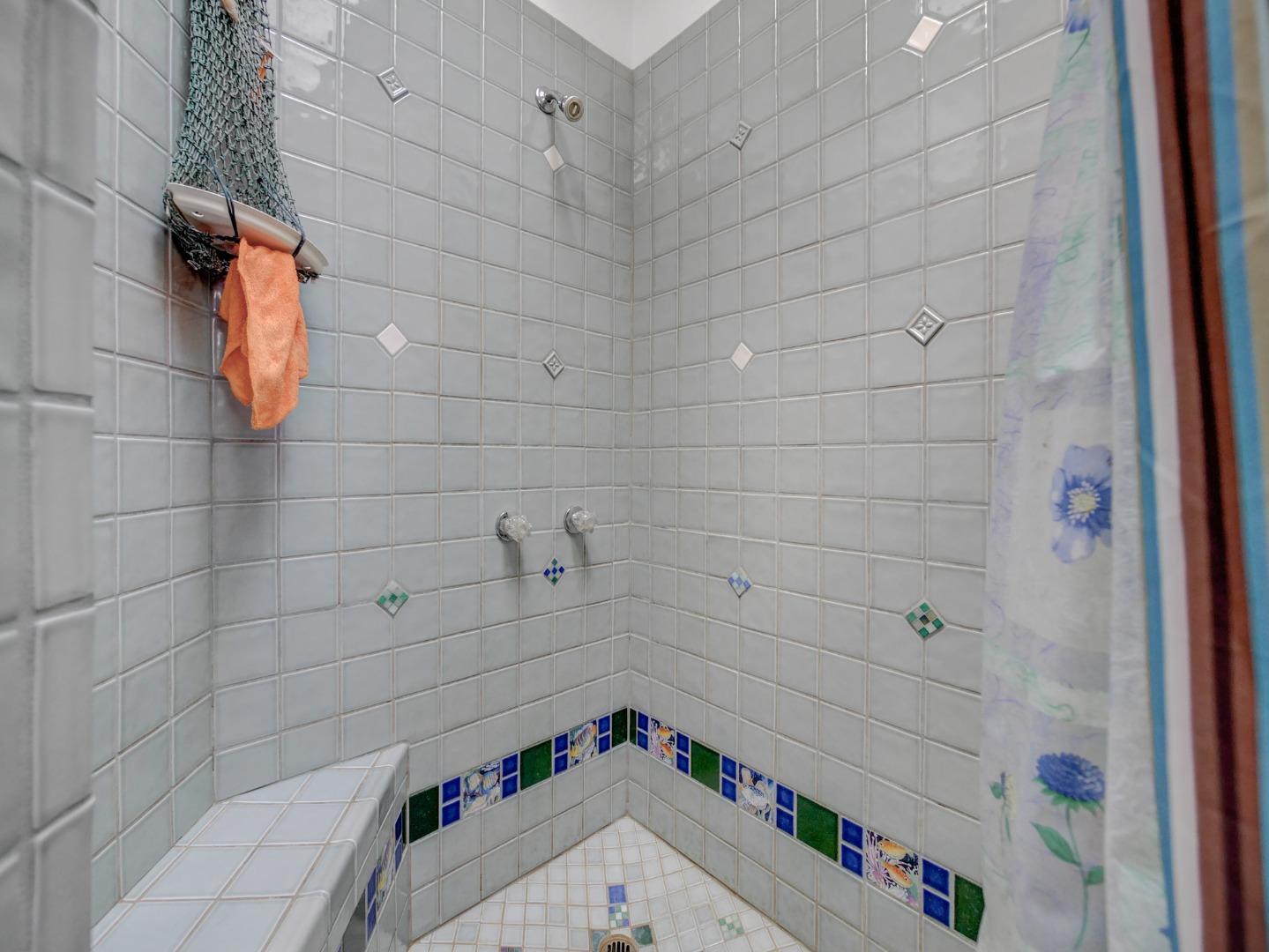770 Calabasas Road Watsonville, CA 95076 - Photo 22 of 39 a bathroom with a bathtub and shower