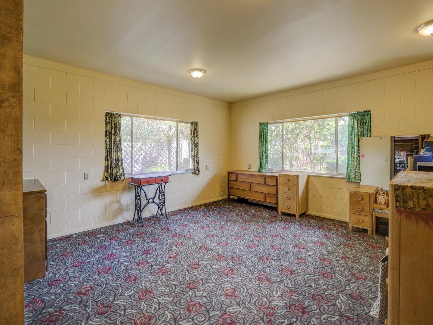 770 Calabasas Road Watsonville, CA 95076 - Photo 24 of 39 a view of a room with window and a flat screen tv