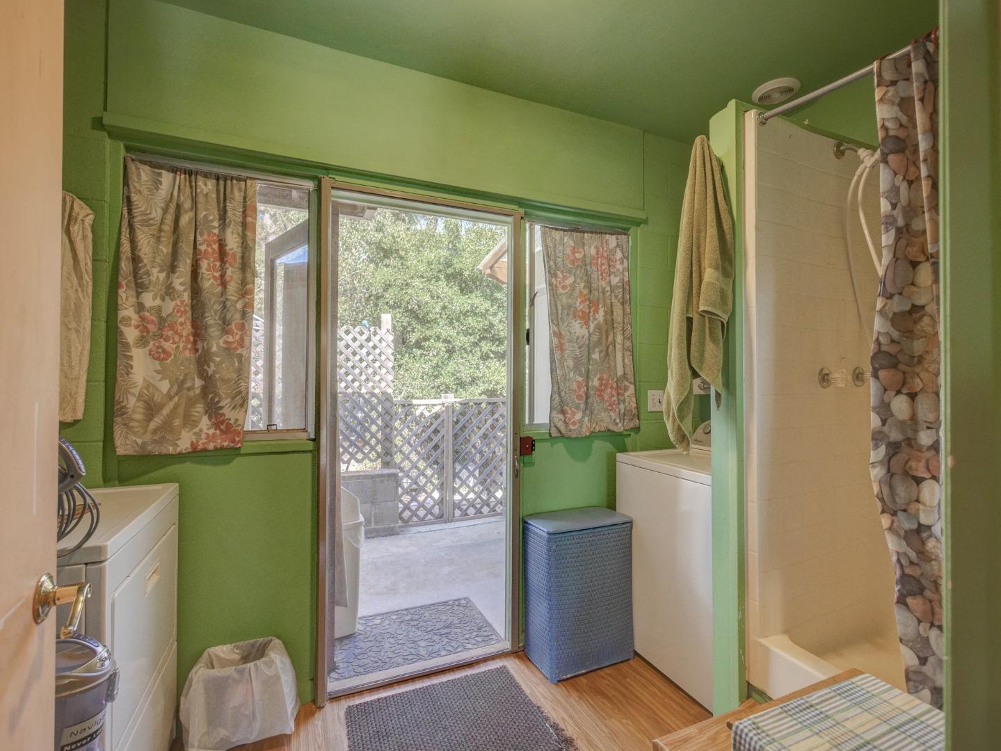 770 Calabasas Road Watsonville, CA 95076 - Photo 28 of 39 a bathroom with a shower and a tub