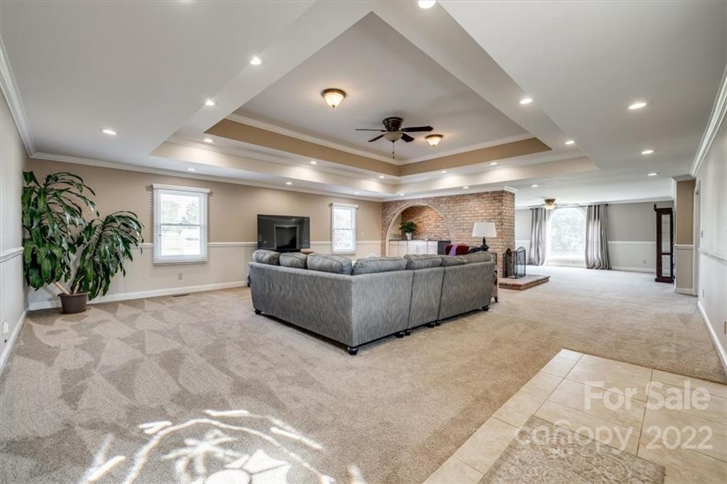 5249 Willow Pond Road Lake Wylie, SC 29710 - Photo 18 of 45 a living room with furniture and a flat screen tv
