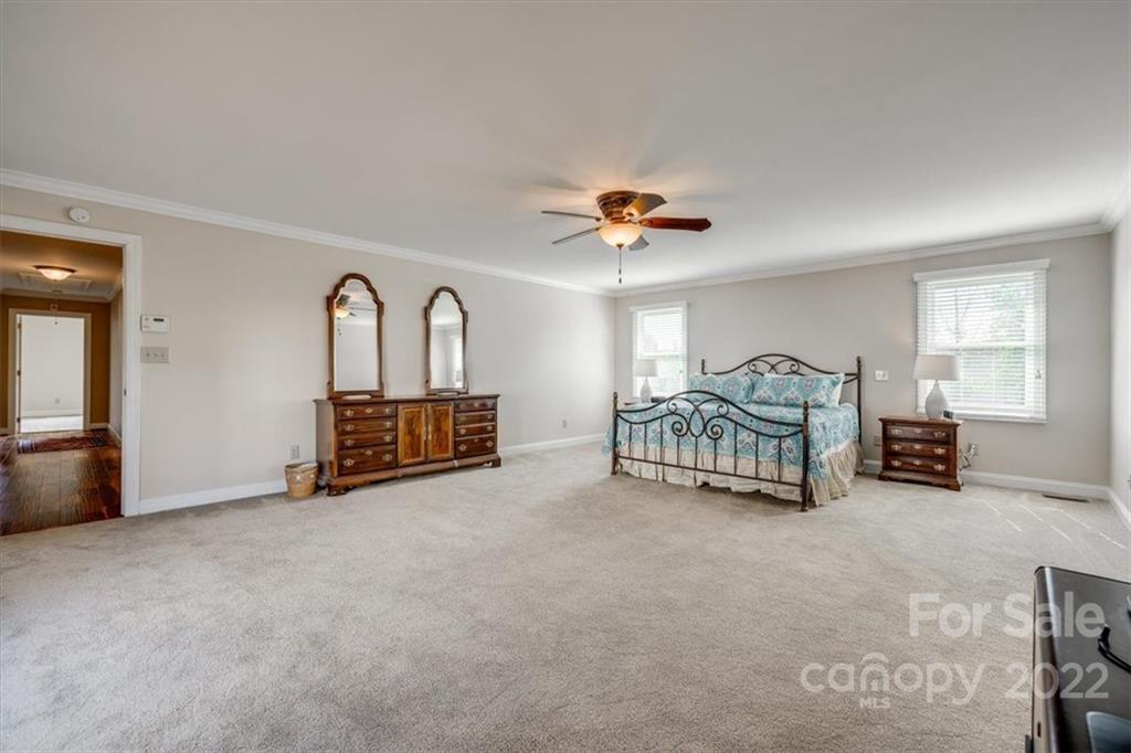 5249 Willow Pond Road Lake Wylie, SC 29710 - Photo 28 of 45 a living room with furniture and a ceiling fan