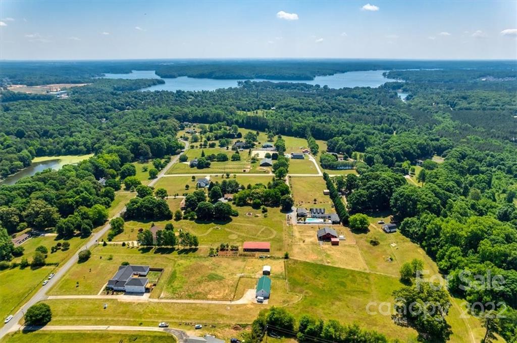 5249 Willow Pond Road Lake Wylie, SC 29710 - Photo 3 of 45 an aerial view of a house with a swimming pool