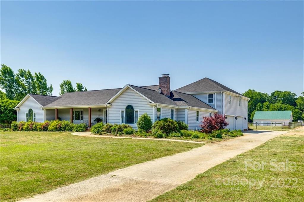 5249 Willow Pond Road Lake Wylie, SC 29710 - Photo 6 of 45 a front view of house with yard and green space