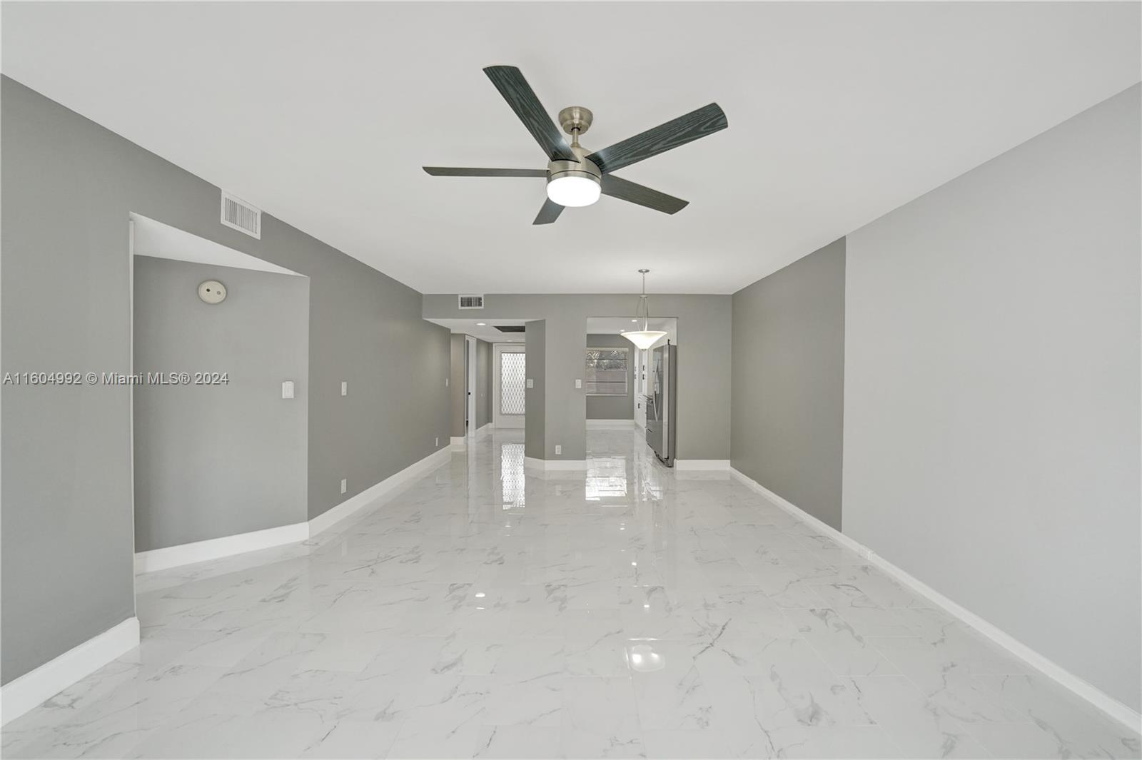 1802 Eleuthera Point, Unit E3 Coconut Creek, FL 33066 - Photo 17 of 78 a view of an empty room